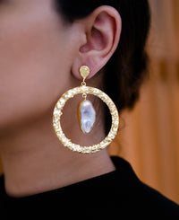 Single drop-in round textured brass earrings