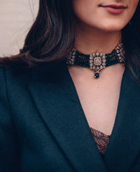 Crystal choker strung together with green quartz beads